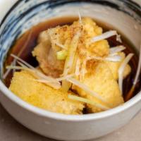 Agedashi Tofu · Fried tofu in soy dashi sauce, garlic, grated radish.