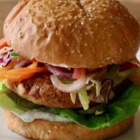 Falafel Burger. · chickpea falafel, pickled zucchini, sesame-vegetable slaw, dill-cucumber yogurt, pumpkin see...