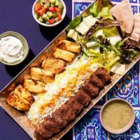 Crown-Worthy Combo Rice Platter · Tender charbroiled chicken skewers and flavorful beef patties, over saffron rice and served ...