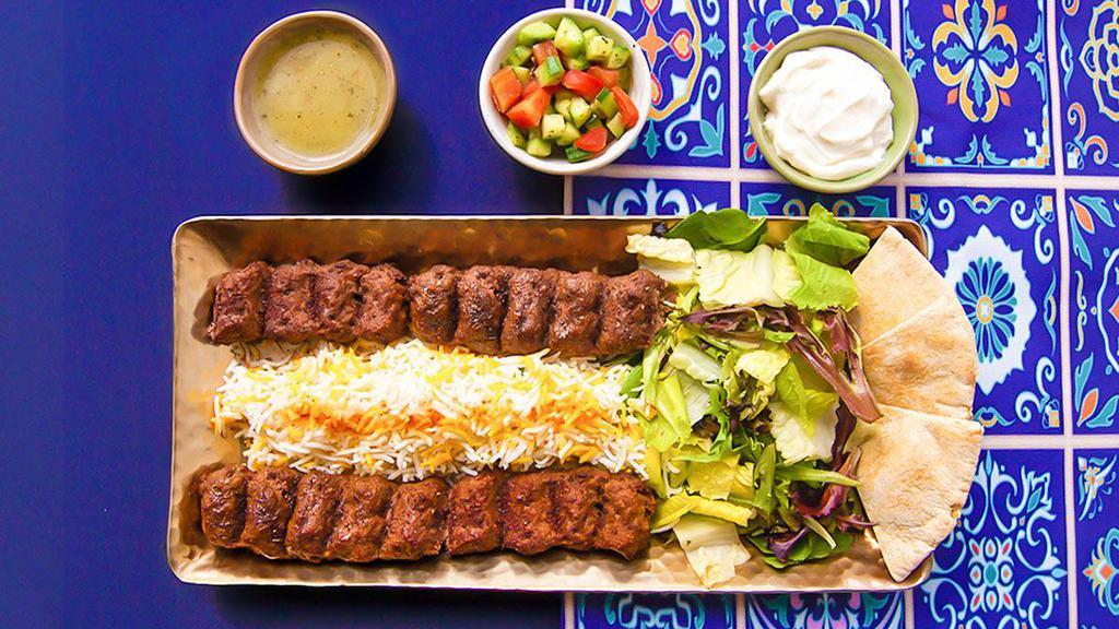 Big Baller Beef And Rice Platter · Flavorful beef patties made in-house with our special blend of spices, over rice. Served with greek salad, tzatziki, and pita.