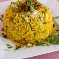 Vegetarian Biriyani · Gluten-free. Basmati rice, zucchini, cauliflower, carrots, mixed vegetables, green peas, cas...