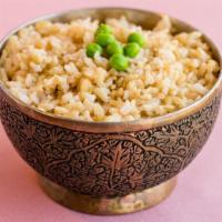Brown Rice (Non-GMO) · Plain brown rice with peas.