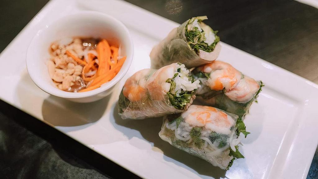 A4-Spring Rolls - Veggie Rolls · Light and refreshing ingredients including sliced shrimps with rice noodles, bean sprouts, lettuce and a touch of mint leaves, wrapped in rice paper and pairing it with the savory peanut dipping sauce makes this a perfect breezy, springy appetizer.