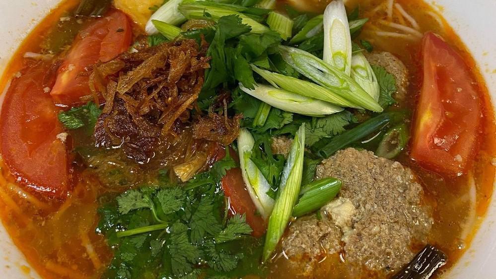 22-Bun Rieu-Crab Paste Tomato Noodle Soup · An authentic recipe of the northern region of Vietnam, this dish is well-known in the country and throughout the world.  It is a clear earthy flavored broth from the minced fresh water crab, served with rice vermicelli and tomatoes.