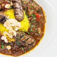 Tabsi Kufta · Ground lamb & beef kebab, eggplant, onions, tomatoes, peppers, garlic, mild curry, dry lime