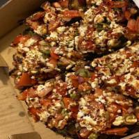 Safeehat Falafel 'pizza · Chickpea crust, pesto, eggplant, roasted bell pepper, green and red onion, mushroom, tomato,...