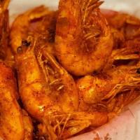 Crawdaddy Shrimp · Head-on/tail-on shrimp deep fried w/ our house Cajun seasoning