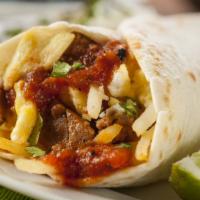 The Mucha Carne Burrito · Delicious overload of marinated, shredded steak and cheese wrapped into a soft tortilla with...