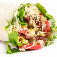 Spicy Tofusion Burrito · Our vegetarian burrito with a spicy kick! Stuffed with our grilled fajita mix (onions, green...