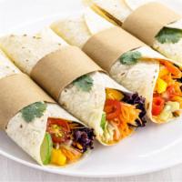 Roasted Veggie Burrito · Fresh veggie burrito with garden fresh veggies and corn salsa, your choice of rice, black be...
