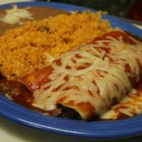 2 Enchiladas Rancheras · 2 Enchiladas Rancheras (Choice of Meat) served with Rice and Beans.

**Please choose Choice ...