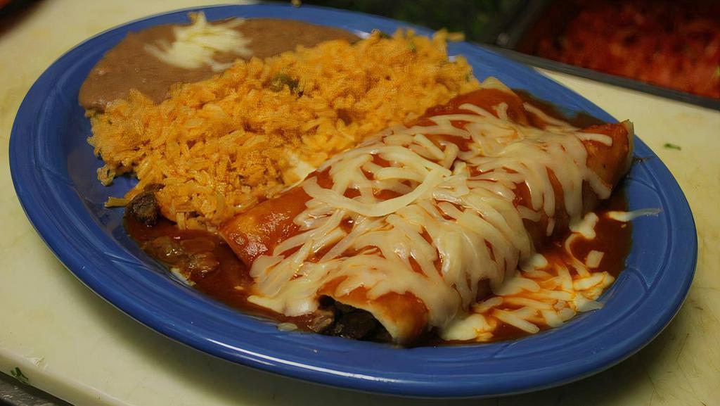 2 Enchiladas Rancheras · 2 Enchiladas Rancheras (Choice of Meat) served with Rice and Beans.

**Please choose Choice of MEAT
