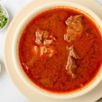 Birria Caldo · Beef stew in soup
x3 tortillas handmade
side of onions cilantro and salsa.
