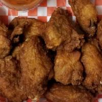 Bone-In Wings · Deep-fried chicken wings with your choice of sauce.