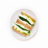 Breakfast Sandwich · Egg whites with spinach, mozzarella, and avocado between two slices of whole wheat toast.