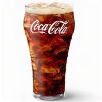 Coca Cola® Small (22 Oz) · 