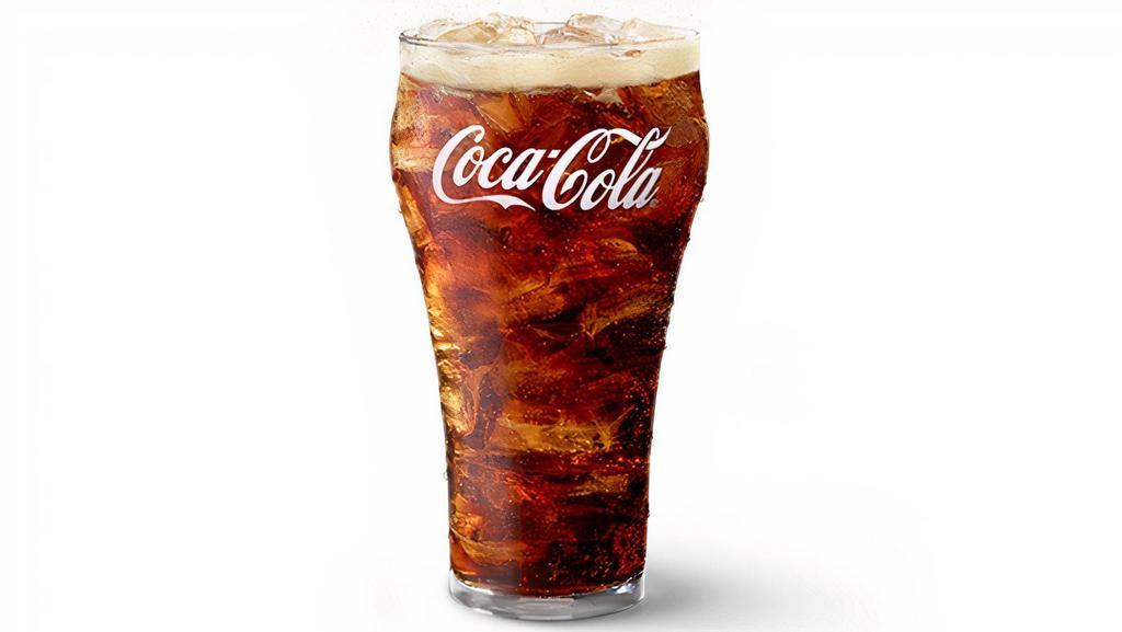 Coca Cola® Medium (32 Oz) · 