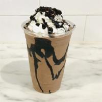Midnight Cookie · Chocolate ice cream blend with OREO cookies and dark chocolate chip. Topped with whipped cre...
