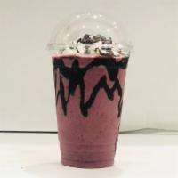 Raspberry Truffle · Raspberry swirl ice cream, blend with fudge and dark chocolate chip. Topped with whipped cre...