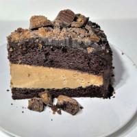Chocolate peanut butter layer cake · chocolate cake with peanut butter layer, topped with chopped peanut butter cup.