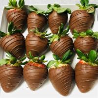 12 Chocolate dipped strawberries · 12 freshly chocolate dipped  strawberries.