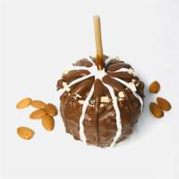 Caramel apple with Almond and Chocolate · Caramel apple with Almond, dipped in chocolate and drizzled.