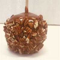 Caramel Apple with PECAN · Granny smith green  apple dipped in caramel and  rolled with Pecan pieces.