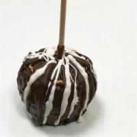 Caramel apple with Peanut and chocolate · Caramel apple with peanut and dipped in chocolate and drizzle.