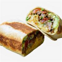 Juan-A-Everything Breakfast Burrito · Two scrambled eggs, bacon, carne asada, breakfast potatoes, avocado and cheese wrapped in a ...