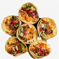 Juan-A-Build Your Own Burrito · Two scrambled eggs with your choice of meat and toppings wrapped in a flour tortilla.