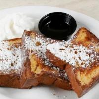 French Toast Breakfast · 3 thick slices of challah bread and served with fresh strawberries.