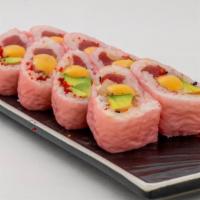 Pink Lady Roll · Tuna, salmon, hamachi, avocado,  and masago rolled in pink soy wrap drizzle with creamy spic...