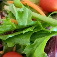 House Salad · Spring mix, carrots and tomatoes. Served with balsamic vinaigrette.