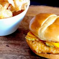Fish Burger · Fried Pacific Cod, Cheddar Cheese, Pickles, Tartare Sauce on Brioche Bun