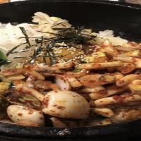 15. Hae Mul Dol sot Bi Bim Bab · Seasoned vegetable with seafood and fried egg (spicy)