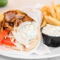 Pork Gyro Pita · Wrapped in pita bread filled with tomatoes, onion, tzatziki and a few French fries.