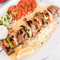 Beef Souvlaki Plate · Gluten free. Beef skewer with Greek herbs and spices, pita bread and tzatziki sauce