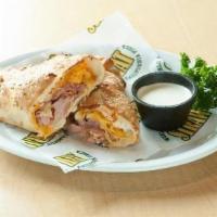 Ham and Cheese Hot Hat · Stuffed with ham and three cheese. Comes with potato wedges.