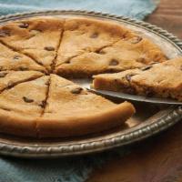 Pizza Cookie · 8'' warm choclate chip cookie to feed the group.