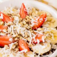 Paradise Bowl · Açaí berries, pineapples, and apples
blended with orange juice, topped with
GF homemade gran...