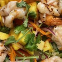 25. Mango Prawn Salad · Shredded mango tossed with carrots, cashew nuts, onions and lime juice.