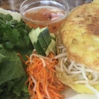 Vietnamese Crepe Banh Xeo · Its made with chicken and shrimp!