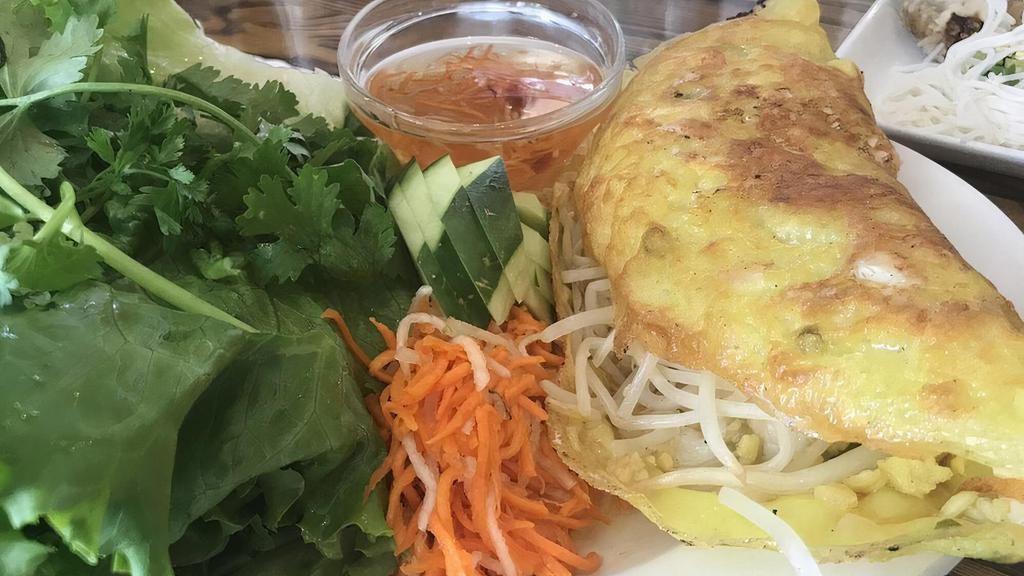 Vietnamese Crepe Banh Xeo · Its made with chicken and shrimp!