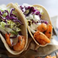 Grilled Shrimp Tacos · stone ground corn tortillas, tartar sauce, cabbage, served with fresh lime, salsa, spanish r...