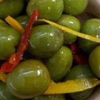 Warm Olives · Mix of olives with calabrian chile and orange peel.