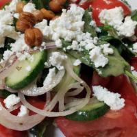 Mediterranean Salad · red lettuce, persian cucumber, heirloom tomato, red onion, French feta, fried garbanzos, red...