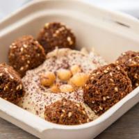 Kids Hummus Snacker · A scoop of our delicious Hummus with five falafel balls and Tahini. A kids favorite!