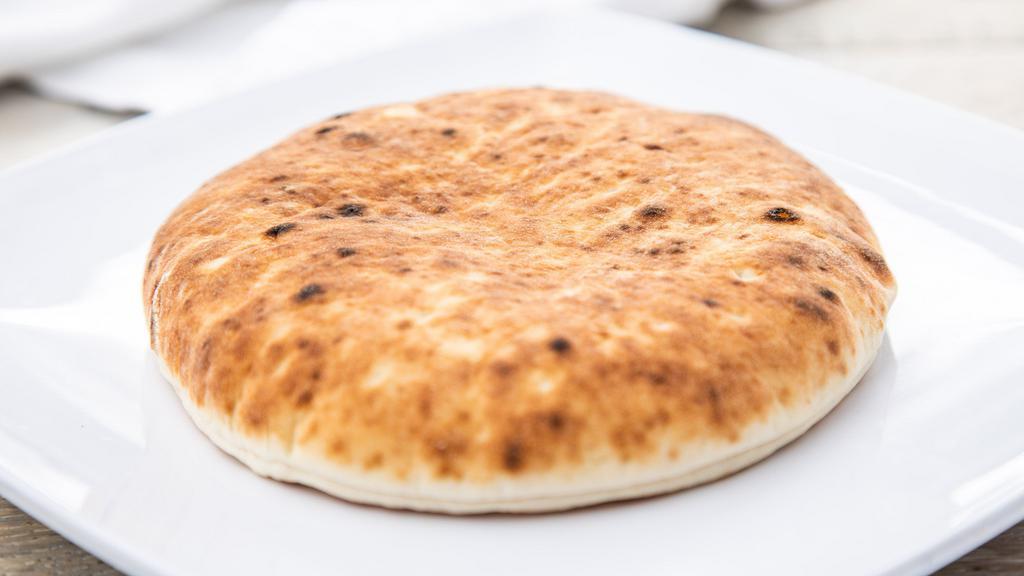 Pita · Fluffy Pita to add to your Combo, Container or any side!