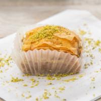 Baklava · Our baklava is a rich, sweet dessert pastry made of layers of phyllo dough filled with chopp...