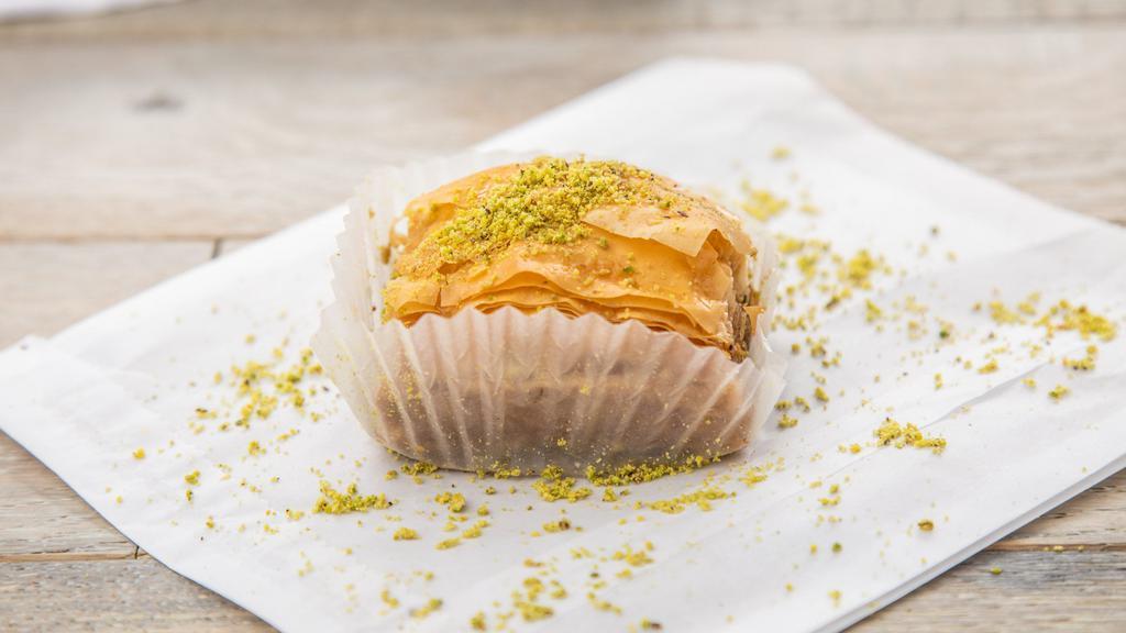 Baklava · Our baklava is a rich, sweet dessert pastry made of layers of phyllo dough filled with chopped walnuts and sweetened and held together with syrup and honey.